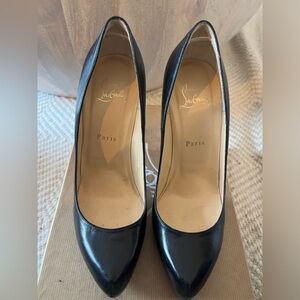 Christian Louboutin black pumps